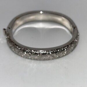 Monet Vintage Silvertone Hinged Bangle With Floral Engraved Design Elegant